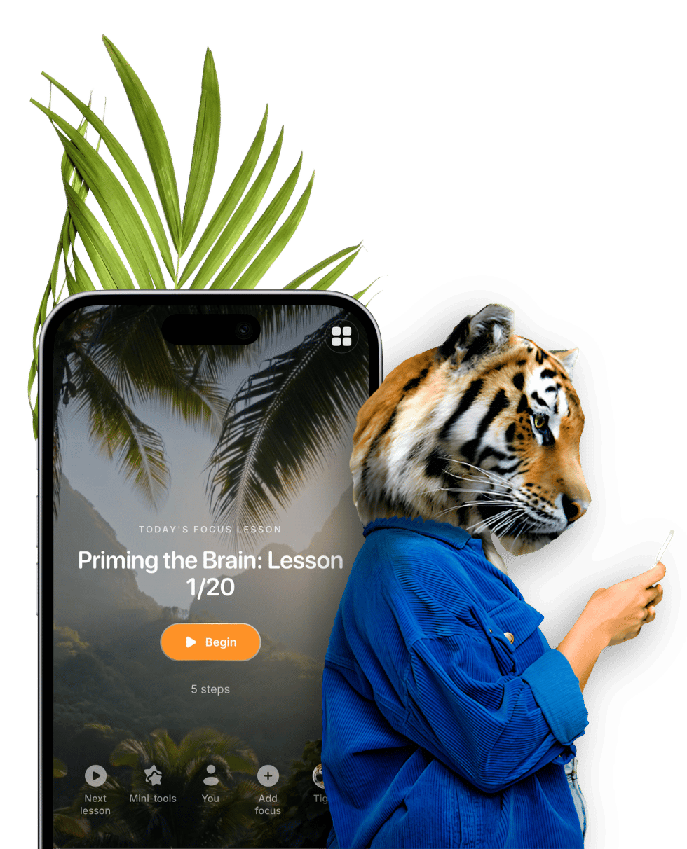 Focus Tiger mascot reading a focus lesson on a phone